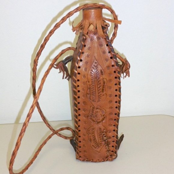 Vintage HAND TOOLED bird LEATHER BOTTLE HOLDER strap